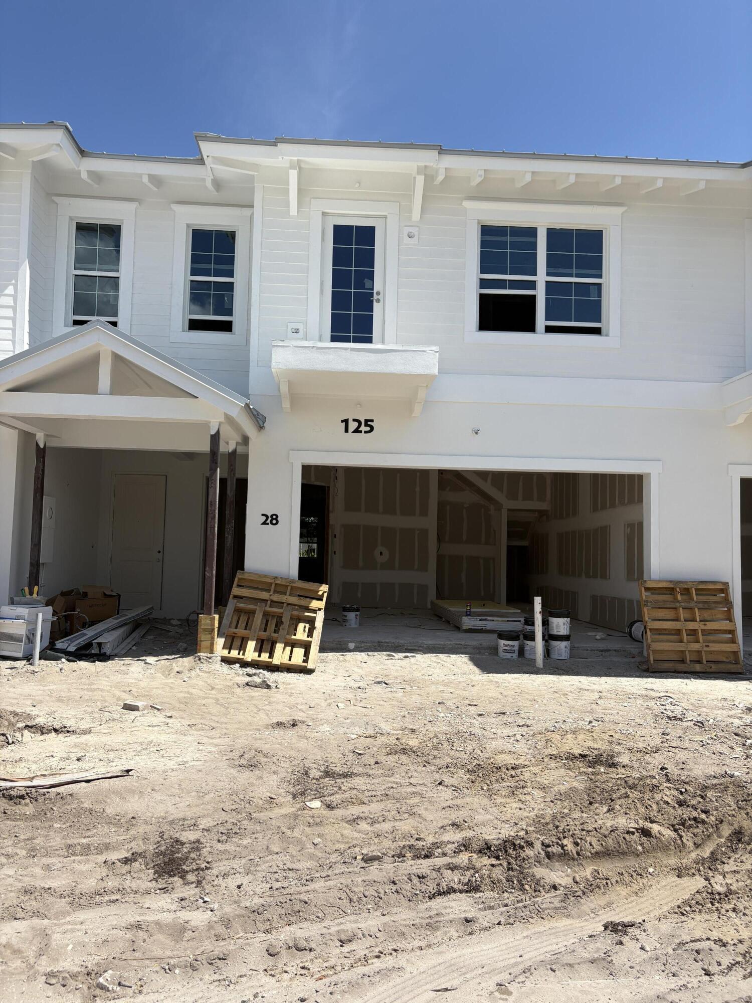 125 Water Pointe Place, Unit 28 Jupiter, FL 33477 - Photo 6 of 19 a view of a terrace with a barbeque oven