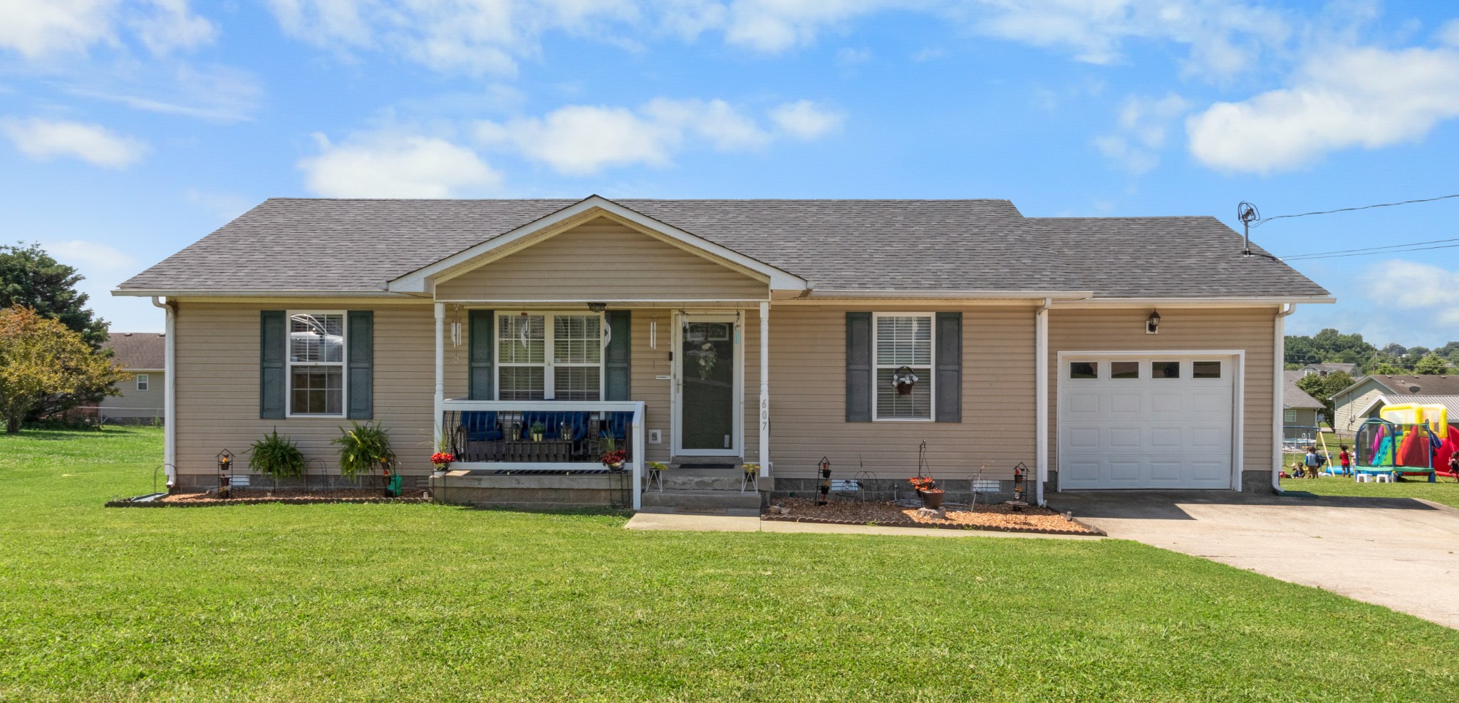 607 Avondale Road Oak Grove, KY 42262 - Photo 1 of 32 a front view of a house with a garden