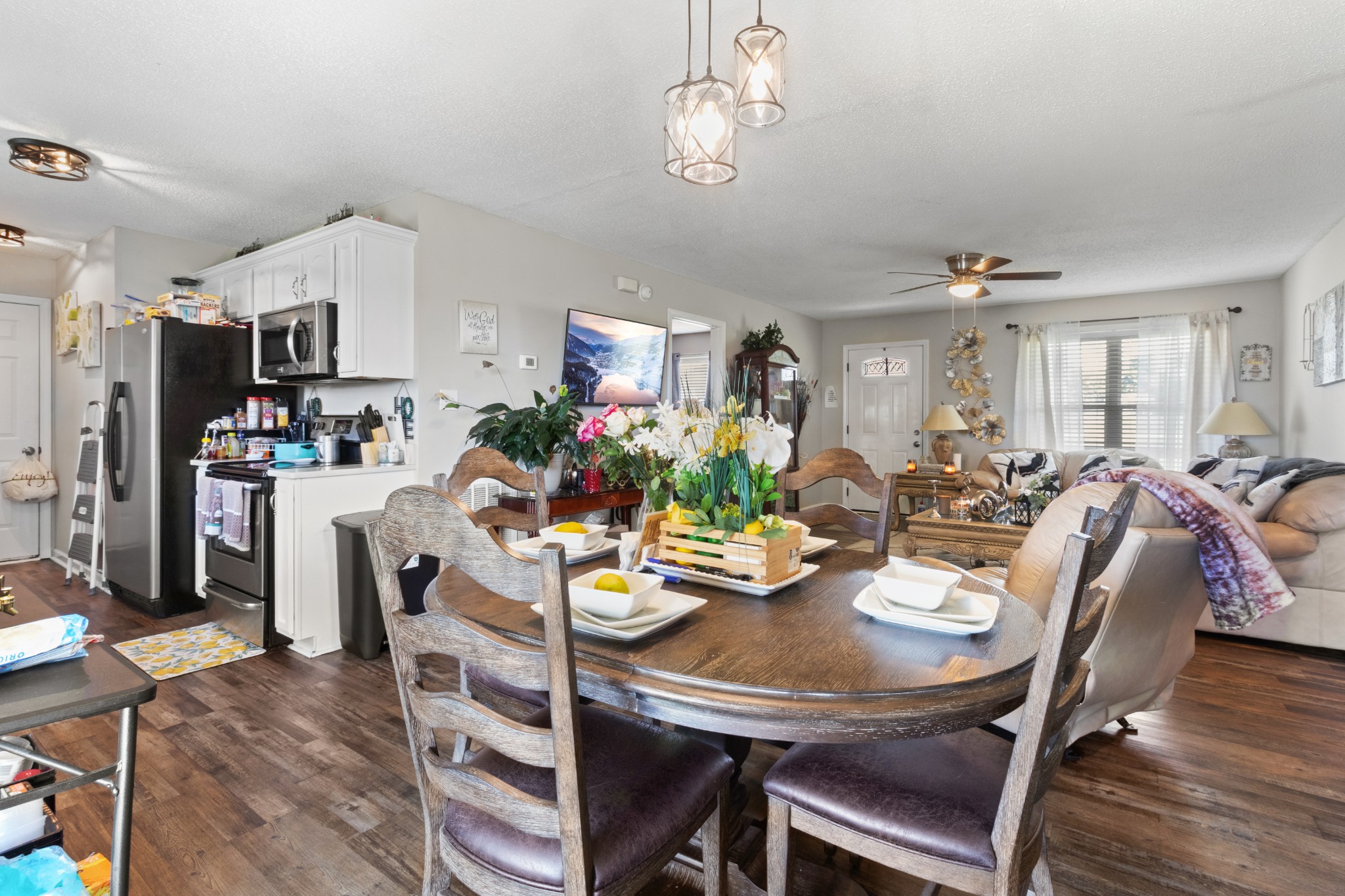 607 Avondale Road Oak Grove, KY 42262 - Photo 12 of 32 a view of a dining room with furniture and a chandelier