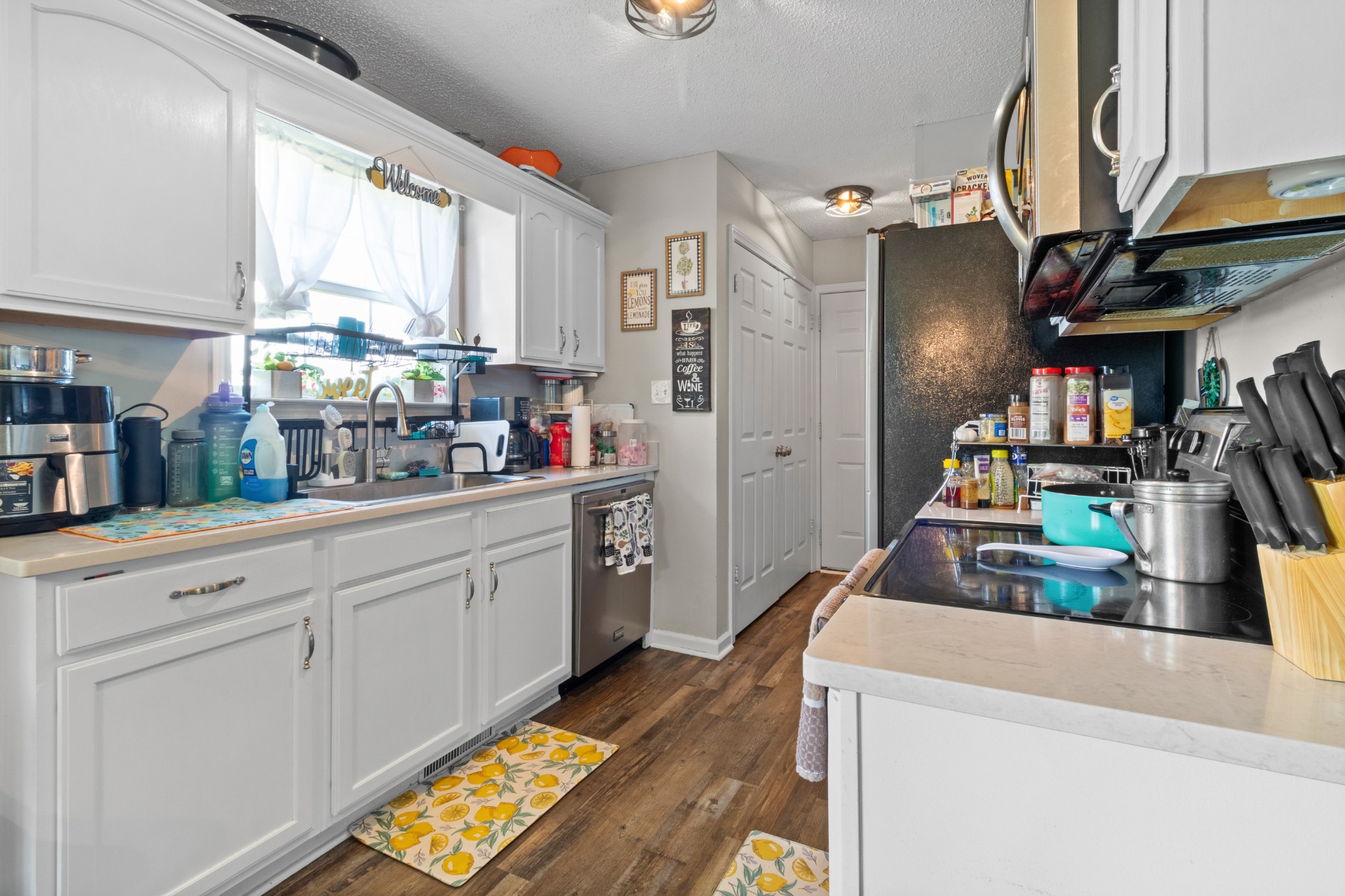 607 Avondale Road Oak Grove, KY 42262 - Photo 13 of 32 a kitchen with refrigerator and window