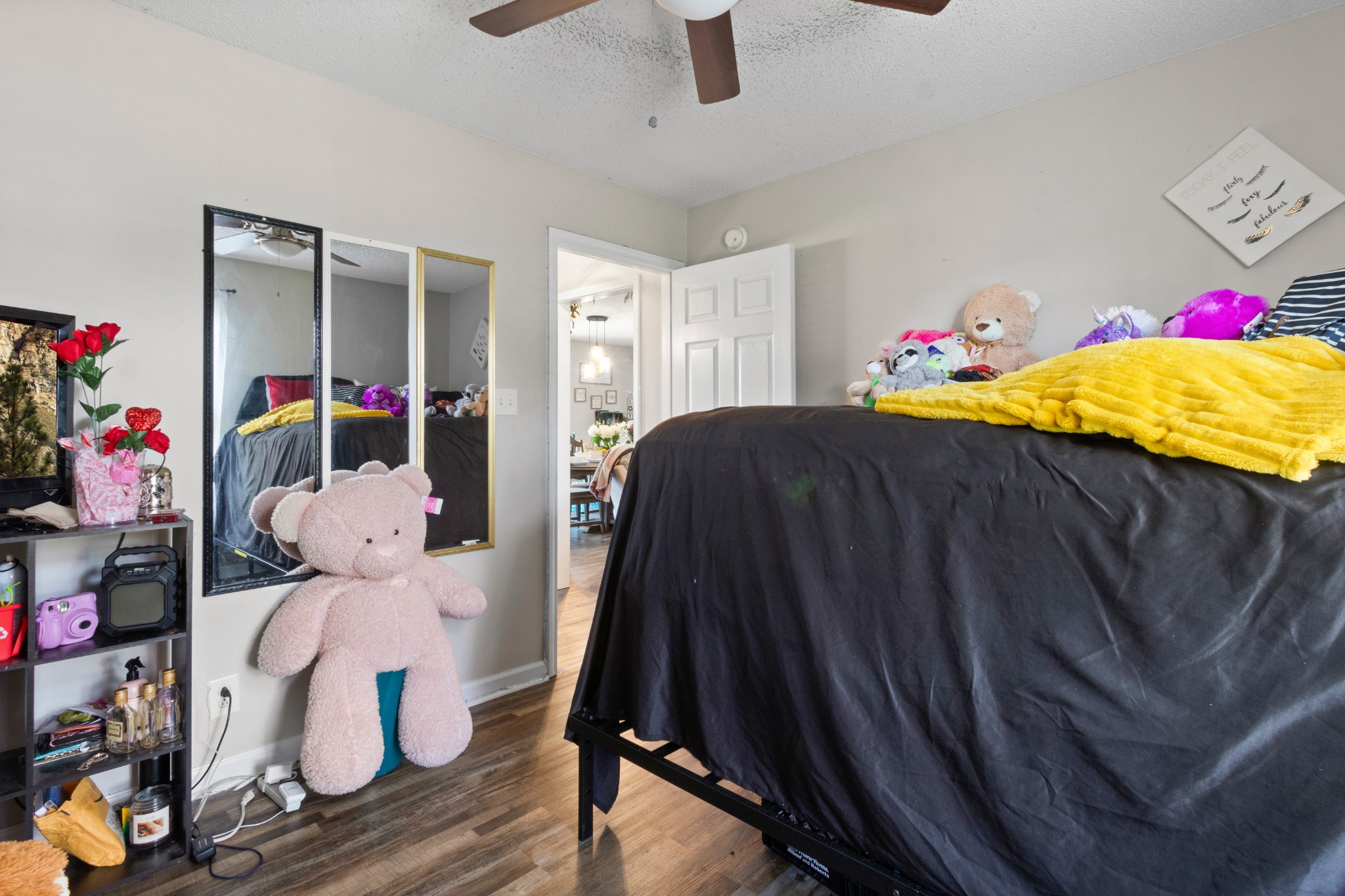 607 Avondale Road Oak Grove, KY 42262 - Photo 17 of 32 a bedroom with a bed and wooden floor