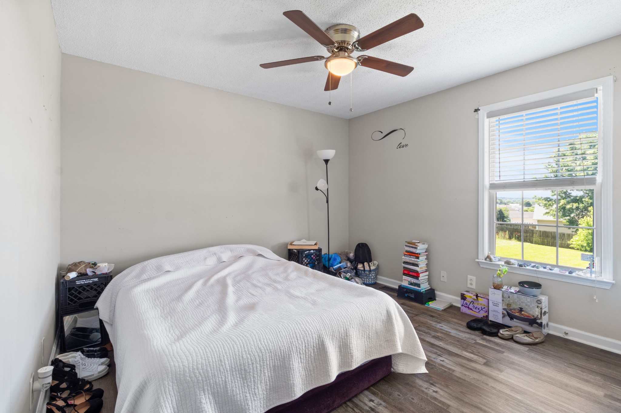 607 Avondale Road Oak Grove, KY 42262 - Photo 19 of 32 a bedroom with a bed and a large window