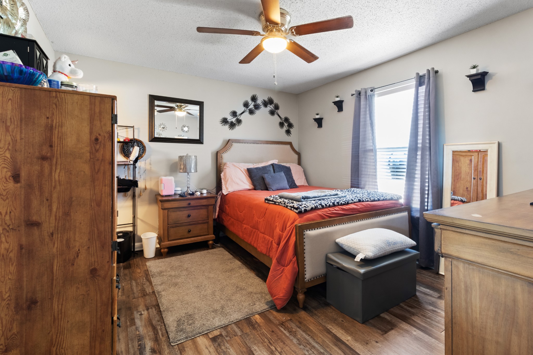 607 Avondale Road Oak Grove, KY 42262 - Photo 21 of 32 a bed room with a bed and a chandelier