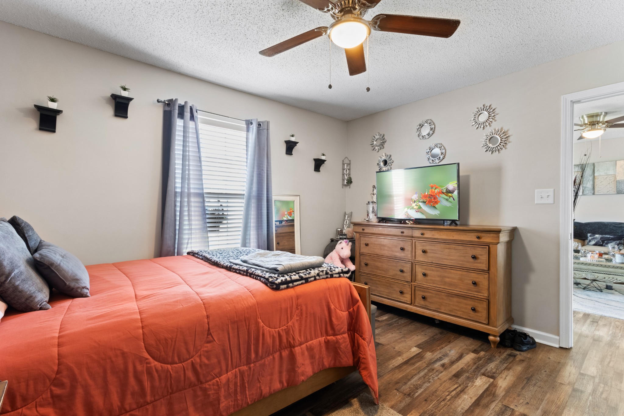607 Avondale Road Oak Grove, KY 42262 - Photo 22 of 32 a bedroom with a bed and a flat screen tv