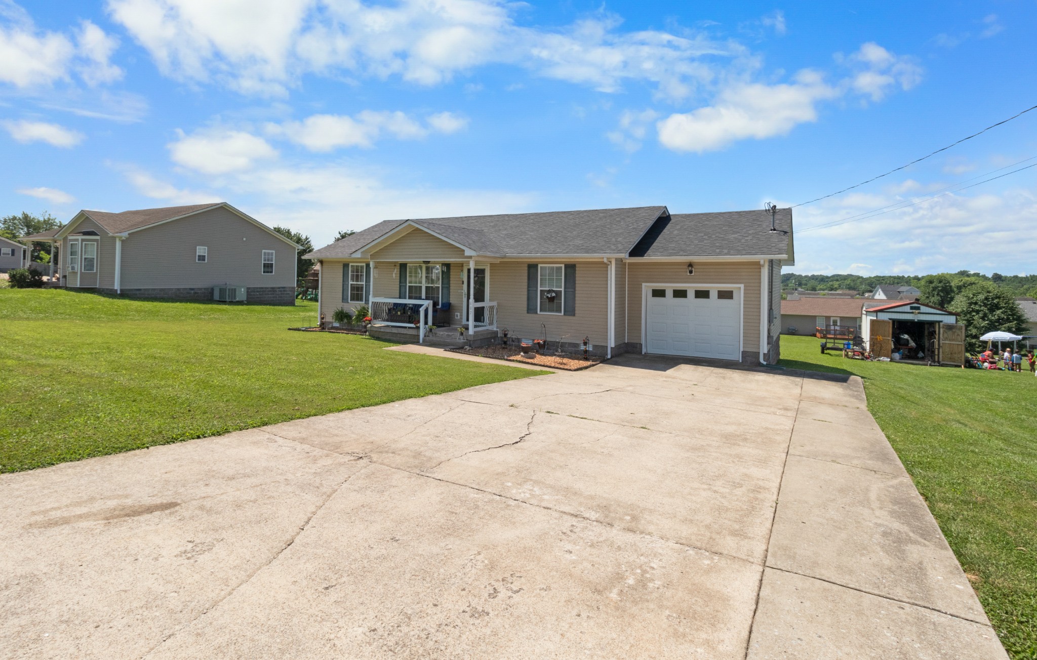 607 Avondale Road Oak Grove, KY 42262 - Photo 3 of 32 a front view of a house with a yard and garage
