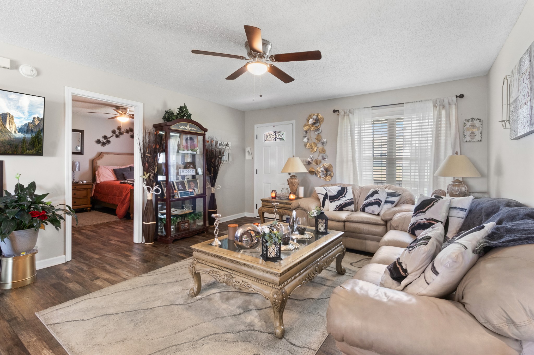 607 Avondale Road Oak Grove, KY 42262 - Photo 10 of 32 a living room with furniture or couch and a large window