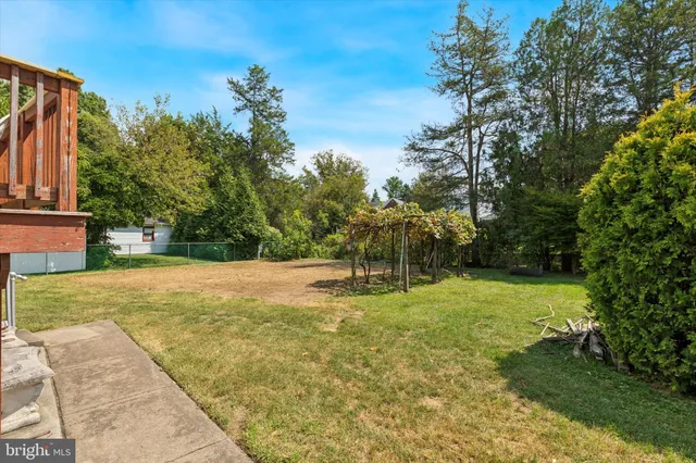 a view of a yard with an outdoor space