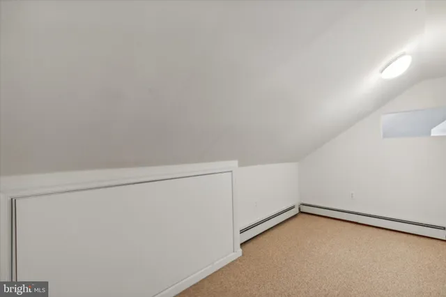 a view of empty room with storage