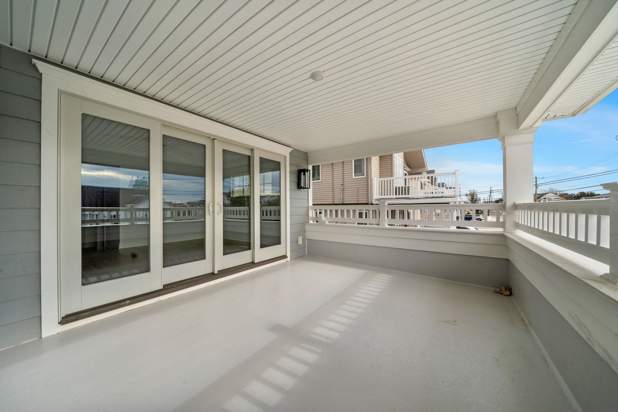 249 35th Street, Unit EAST SIDE Avalon, NJ 08202 - Photo 24 of 45 a view of an empty room with a window