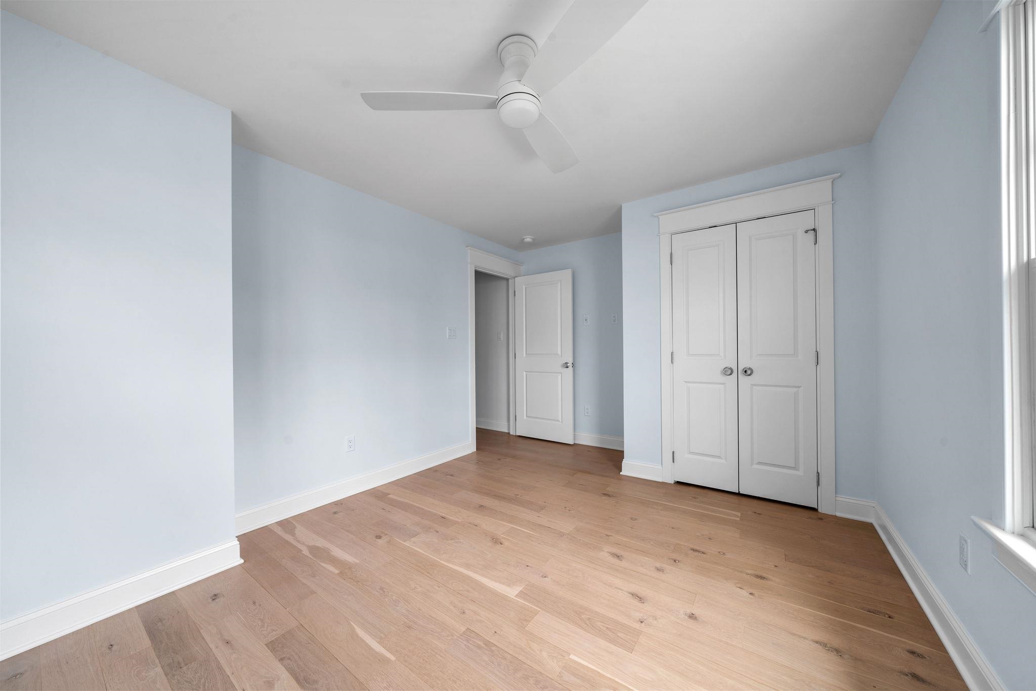 249 35th Street, Unit EAST SIDE Avalon, NJ 08202 - Photo 30 of 45 a view of empty room with wooden floor