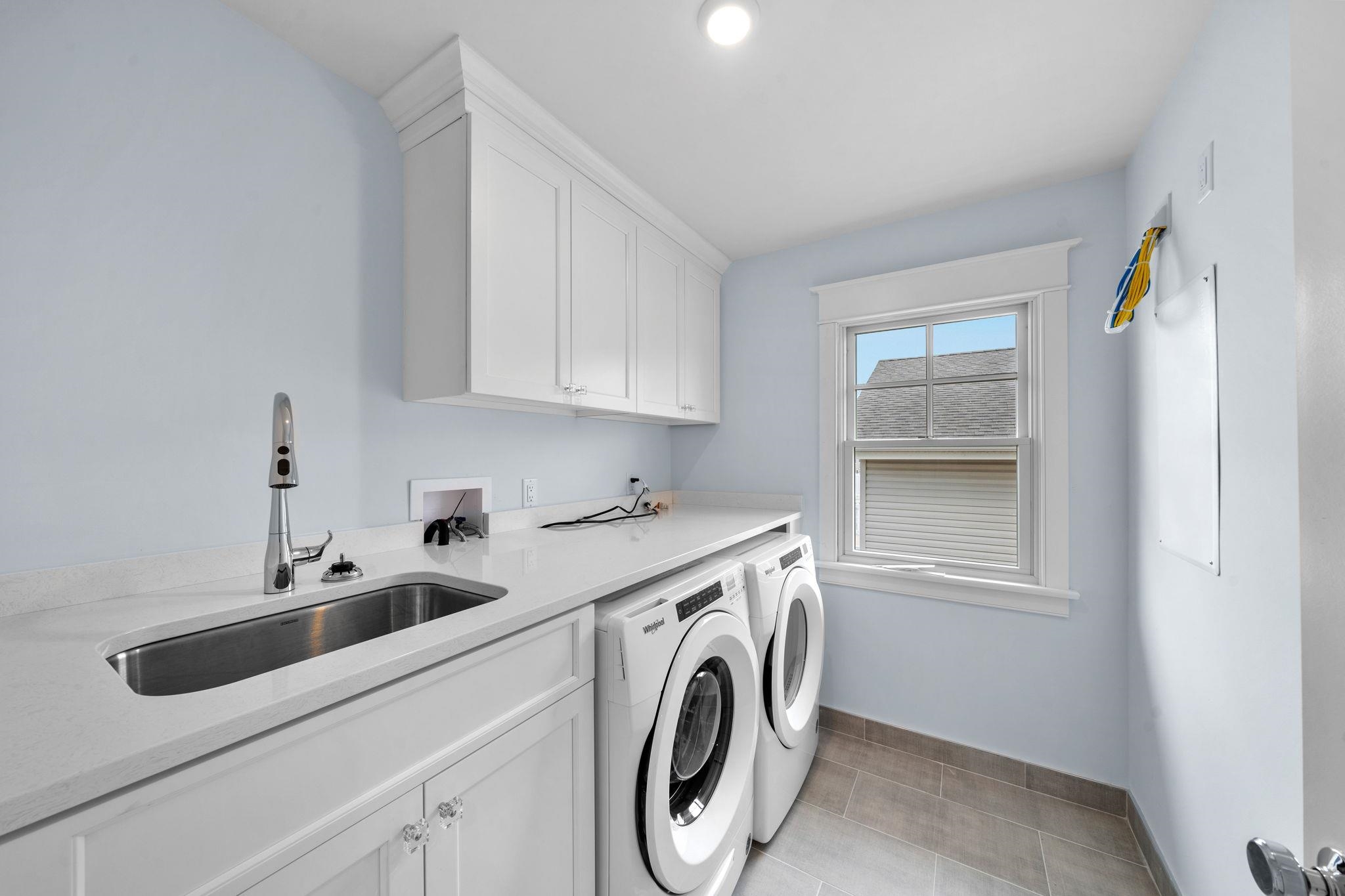 249 35th Street, Unit EAST SIDE Avalon, NJ 08202 - Photo 33 of 45 a utility room with dryer and washer