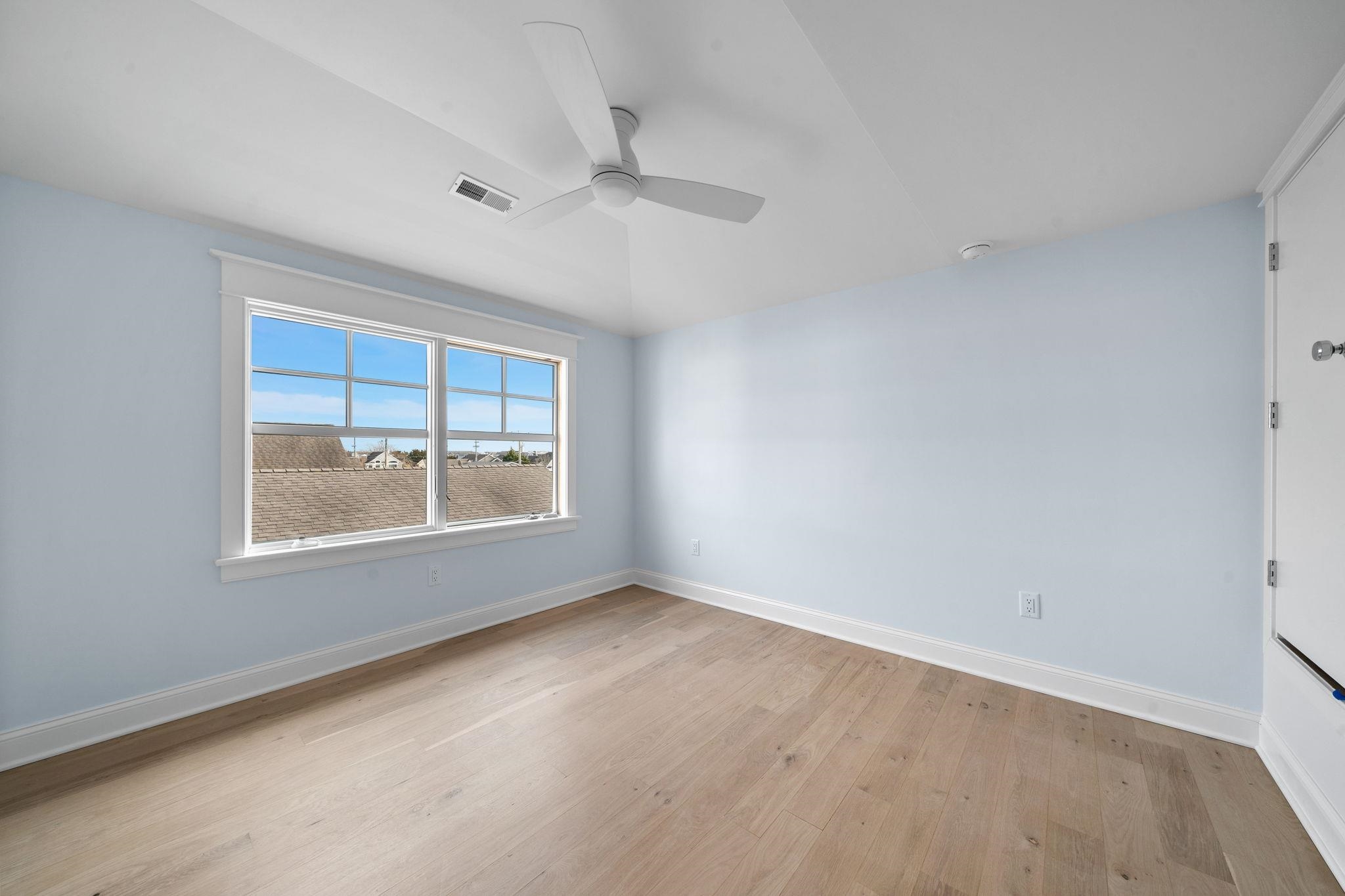 249 35th Street, Unit EAST SIDE Avalon, NJ 08202 - Photo 34 of 45 an empty room with a window