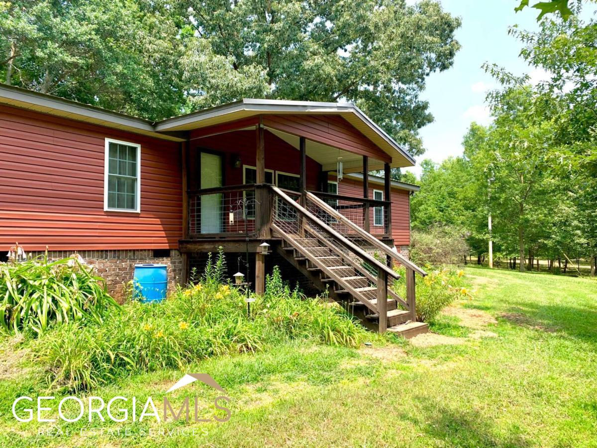 1474 Macedonia Church Road Danielsville, GA 30633 - Photo 1 of 1 a front view of house with yard
