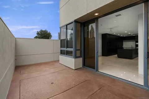 a view of a hallway with white walls