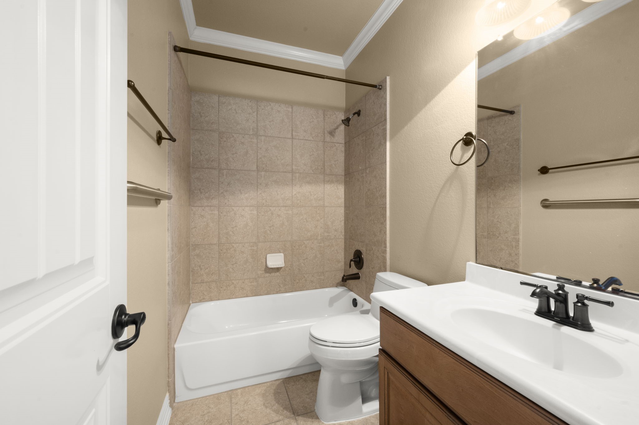 110 David Forest Lane Conroe, TX 77384 - Photo 26 of 35 a bathroom with a sink a toilet a mirror and shower