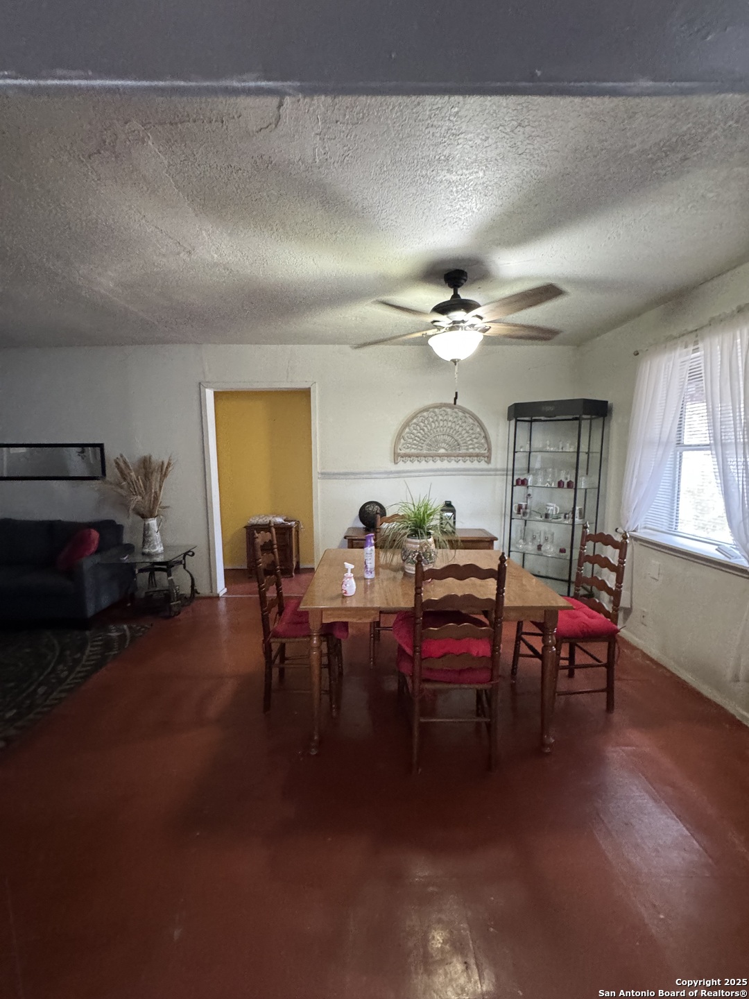 416 16th Street Hondo, TX 78861 - Photo 4 of 6 a view of a livingroom with furniture window and wooden floor