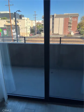 a view of kitchen with furniture and window
