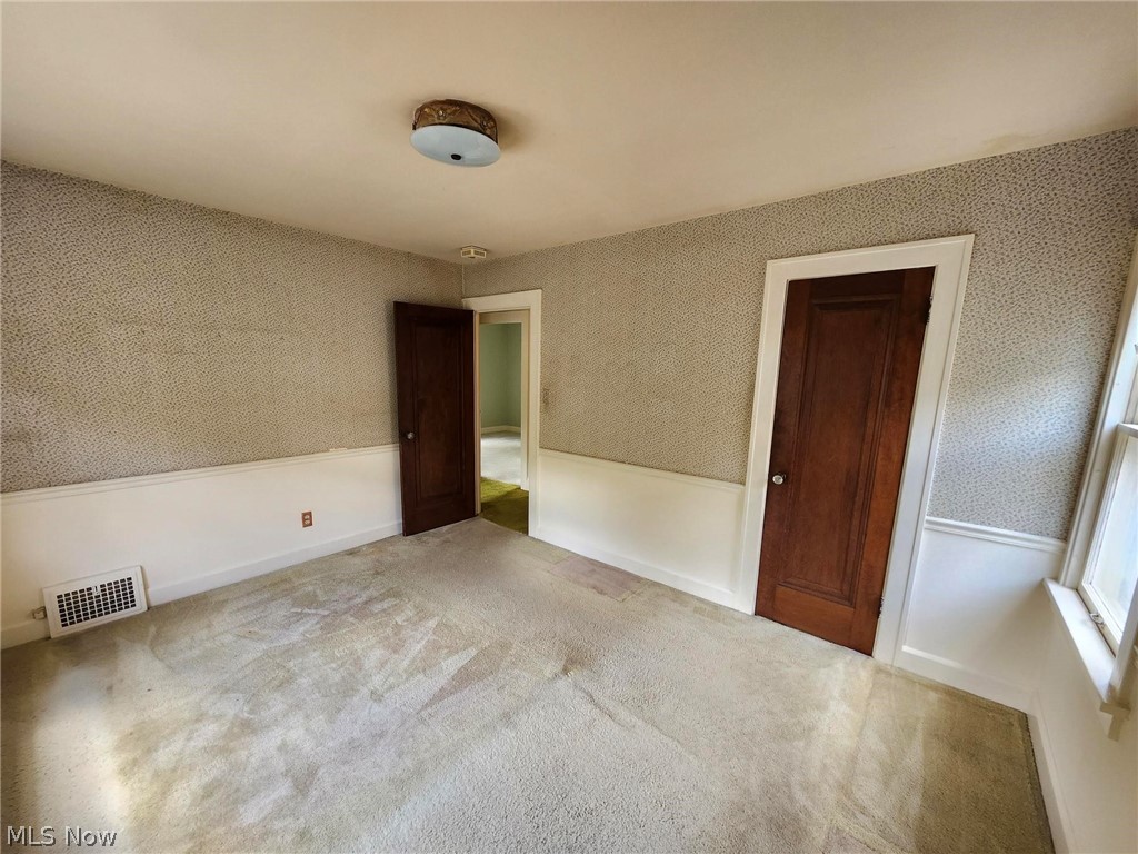 3819 Woodridge Road Cleveland Heights, OH 44121 - Photo 21 of 42 Unfurnished bedroom featuring carpet floors and a closet