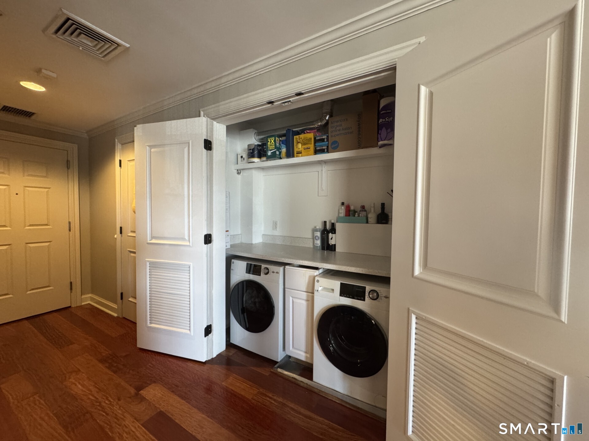 85 Memorial Road, Unit 201 West Hartford, CT 06107 - Photo 31 of 36 a view of kitchen and wooden floor