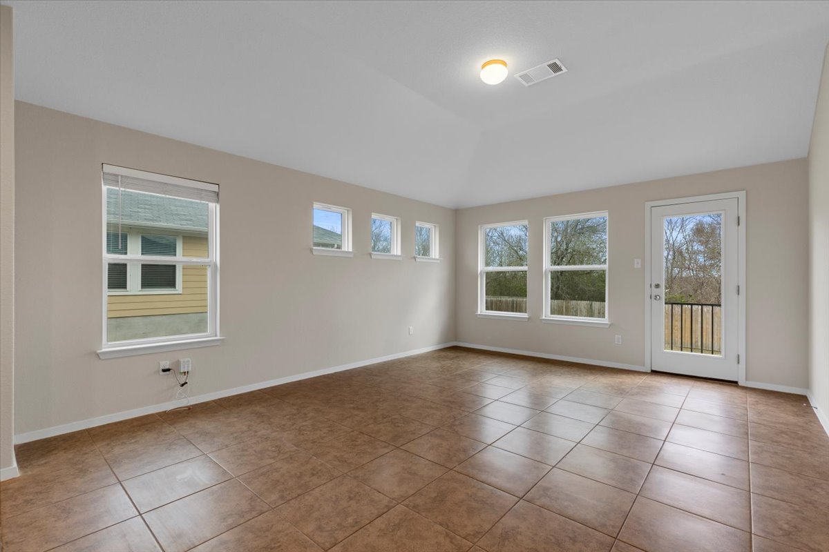 123 Saranac Drive Elgin, TX 78621 - Photo 11 of 26 a view of an empty room with a window