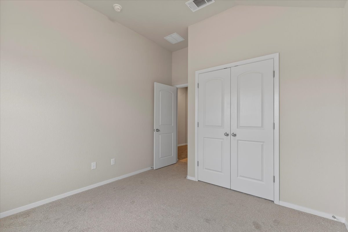 123 Saranac Drive Elgin, TX 78621 - Photo 22 of 26 a view of an empty room and closet area