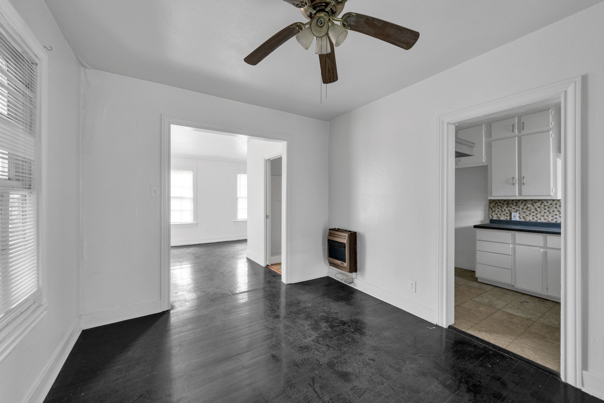 1947 Richmond Avenue, Unit A Houston, TX 77098 - Photo 11 of 14 a view of empty room with wooden floor and window