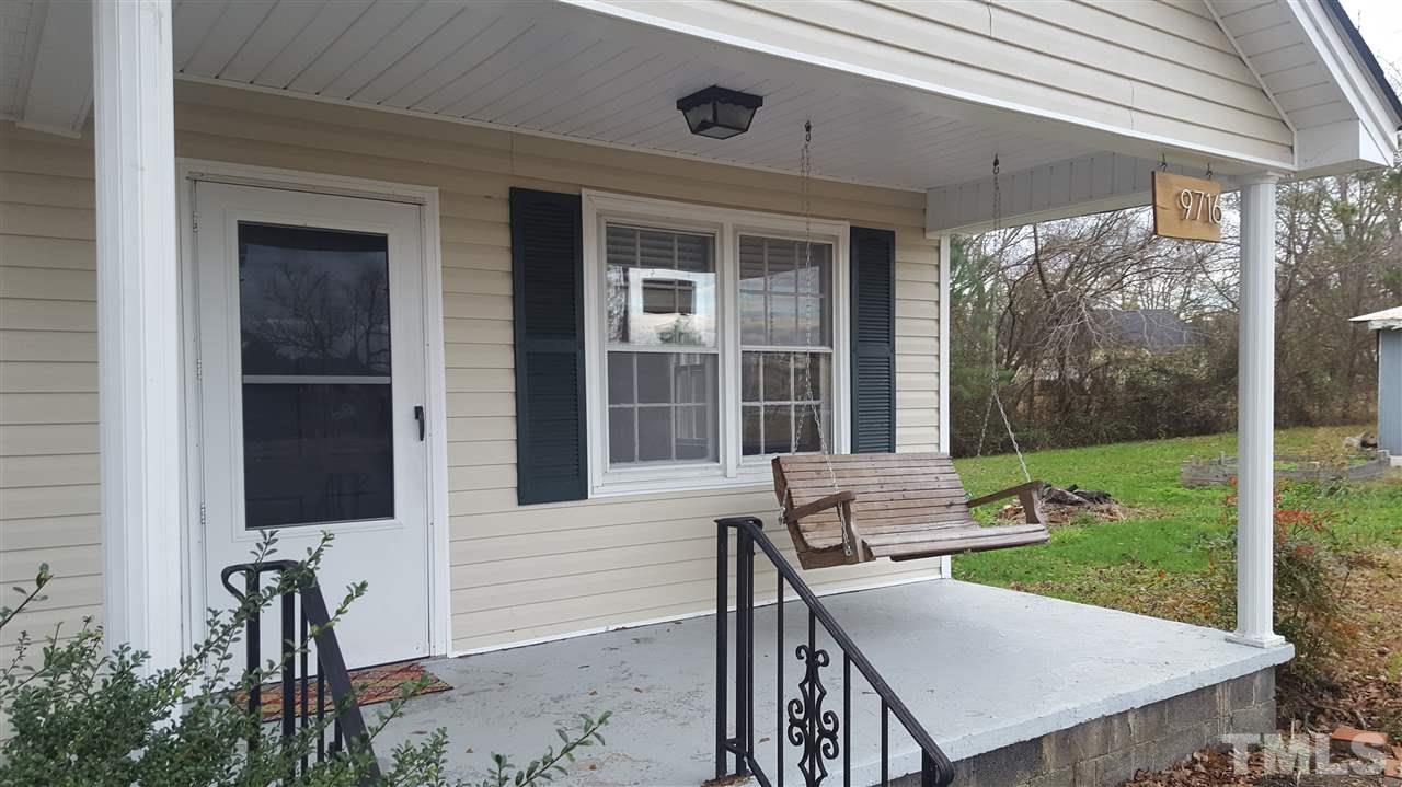 9716 Sauls Road Raleigh, NC 27603 - Photo 8 of 23 front view of a house with a yard