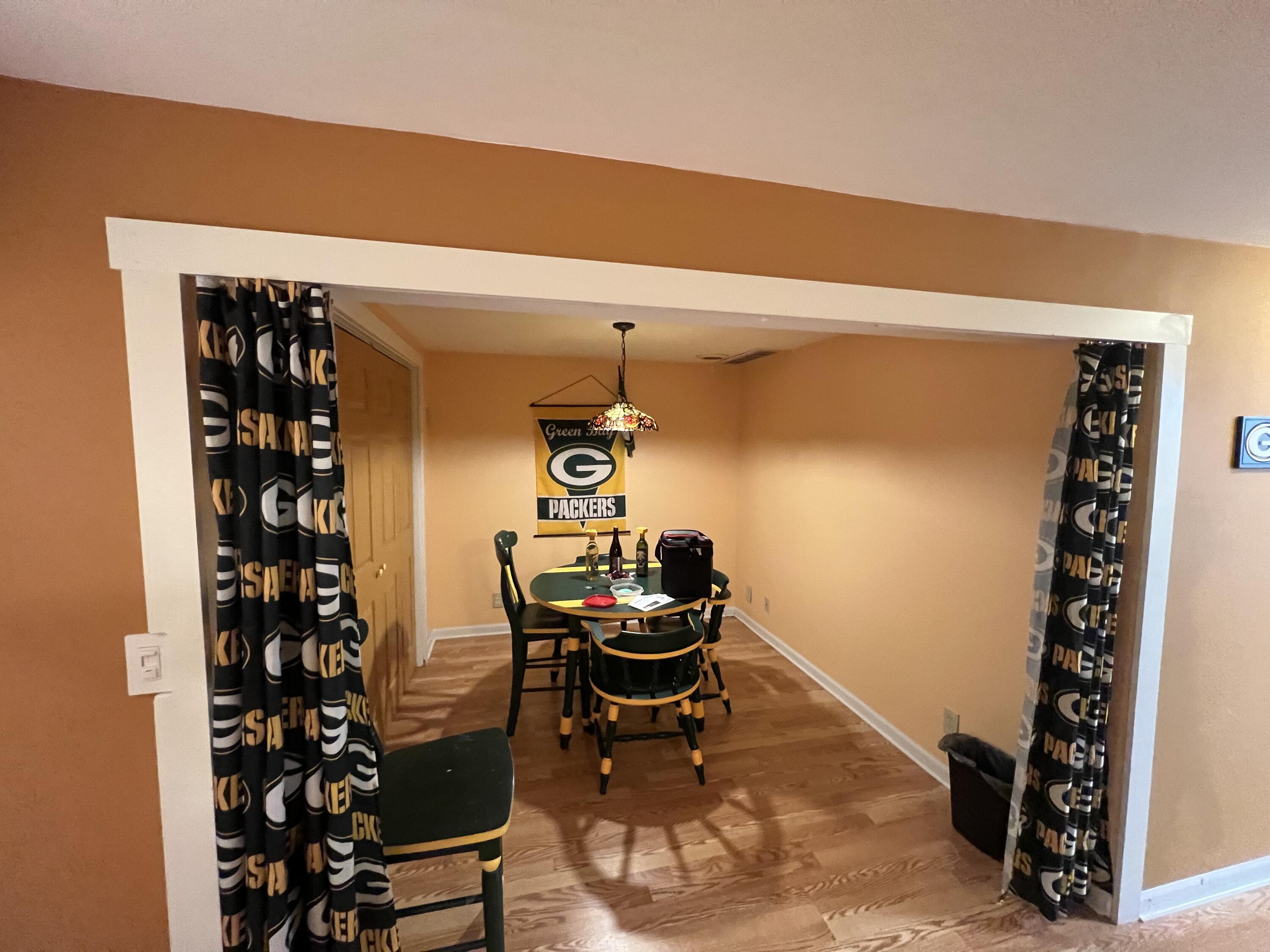 W253-s10980 Hunters Run Mukwonago, WI 53149 - Photo 18 of 30 Basement Rec Room