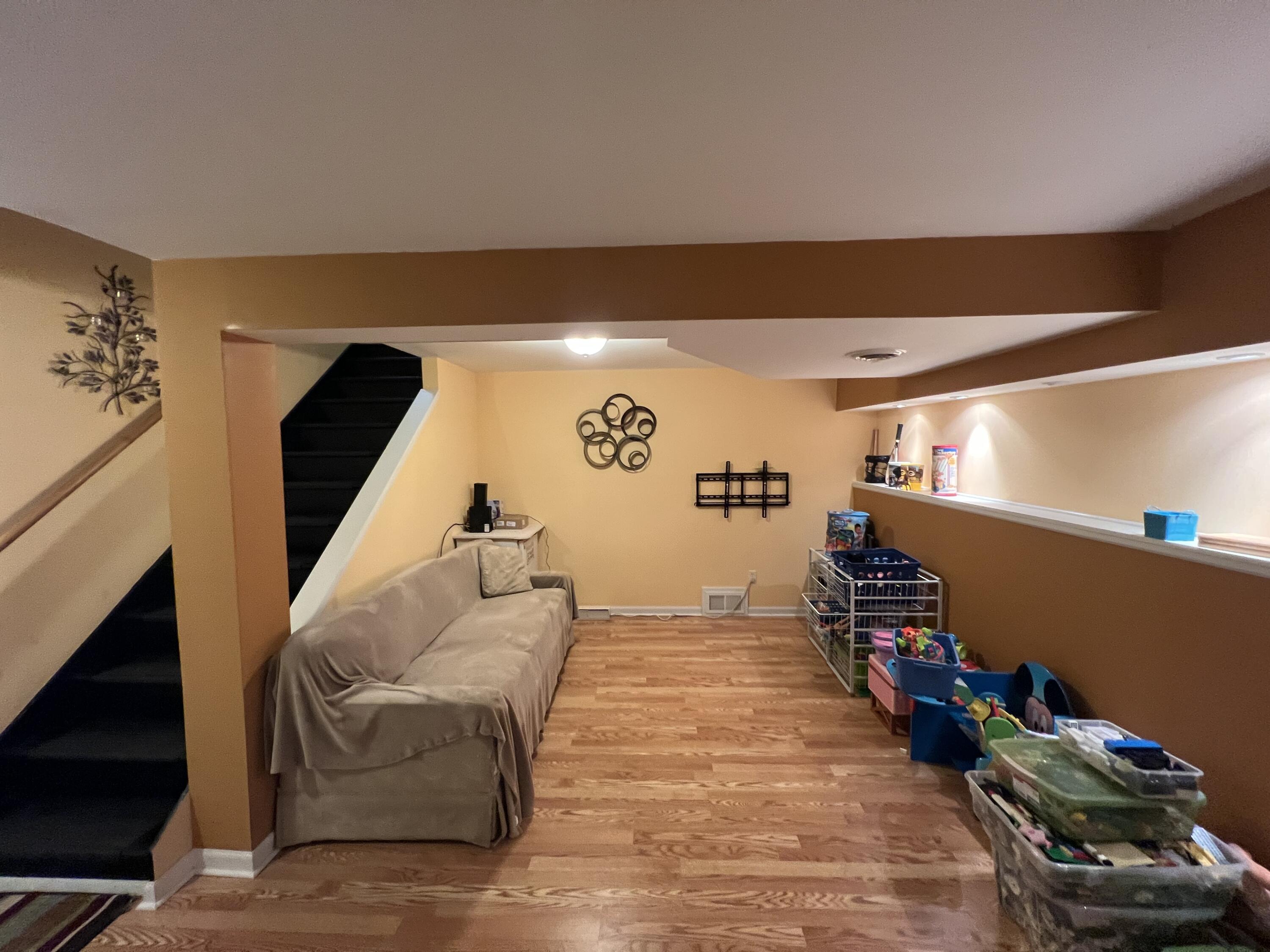 W253-s10980 Hunters Run Mukwonago, WI 53149 - Photo 19 of 30 Basement Rec Room