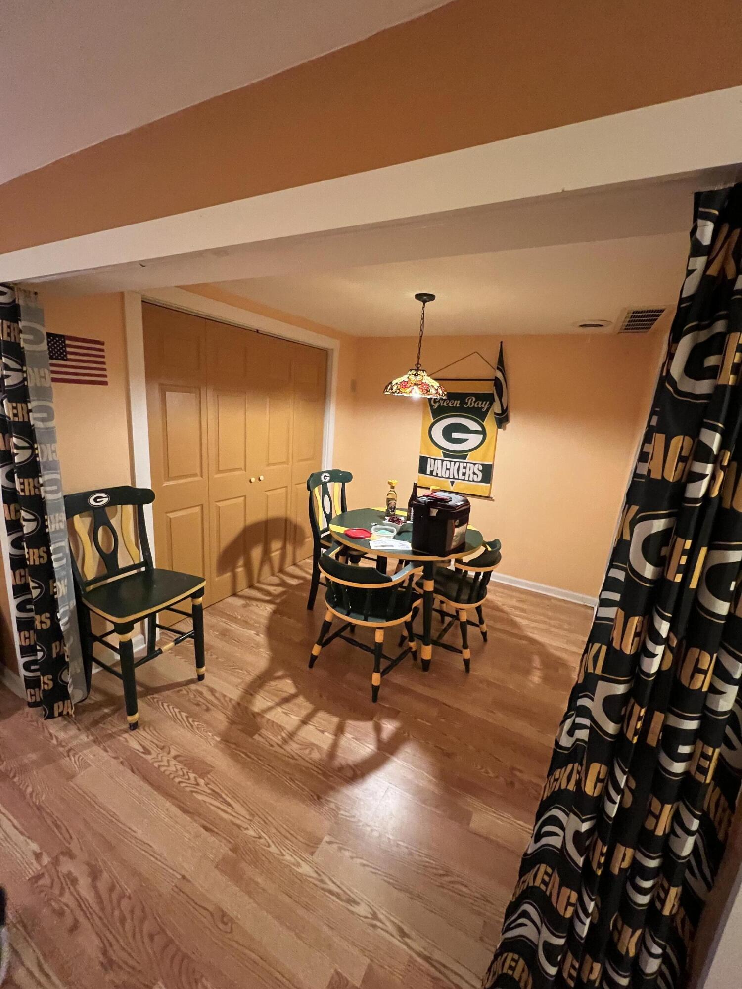 W253-s10980 Hunters Run Mukwonago, WI 53149 - Photo 20 of 30 Basement Rec Room