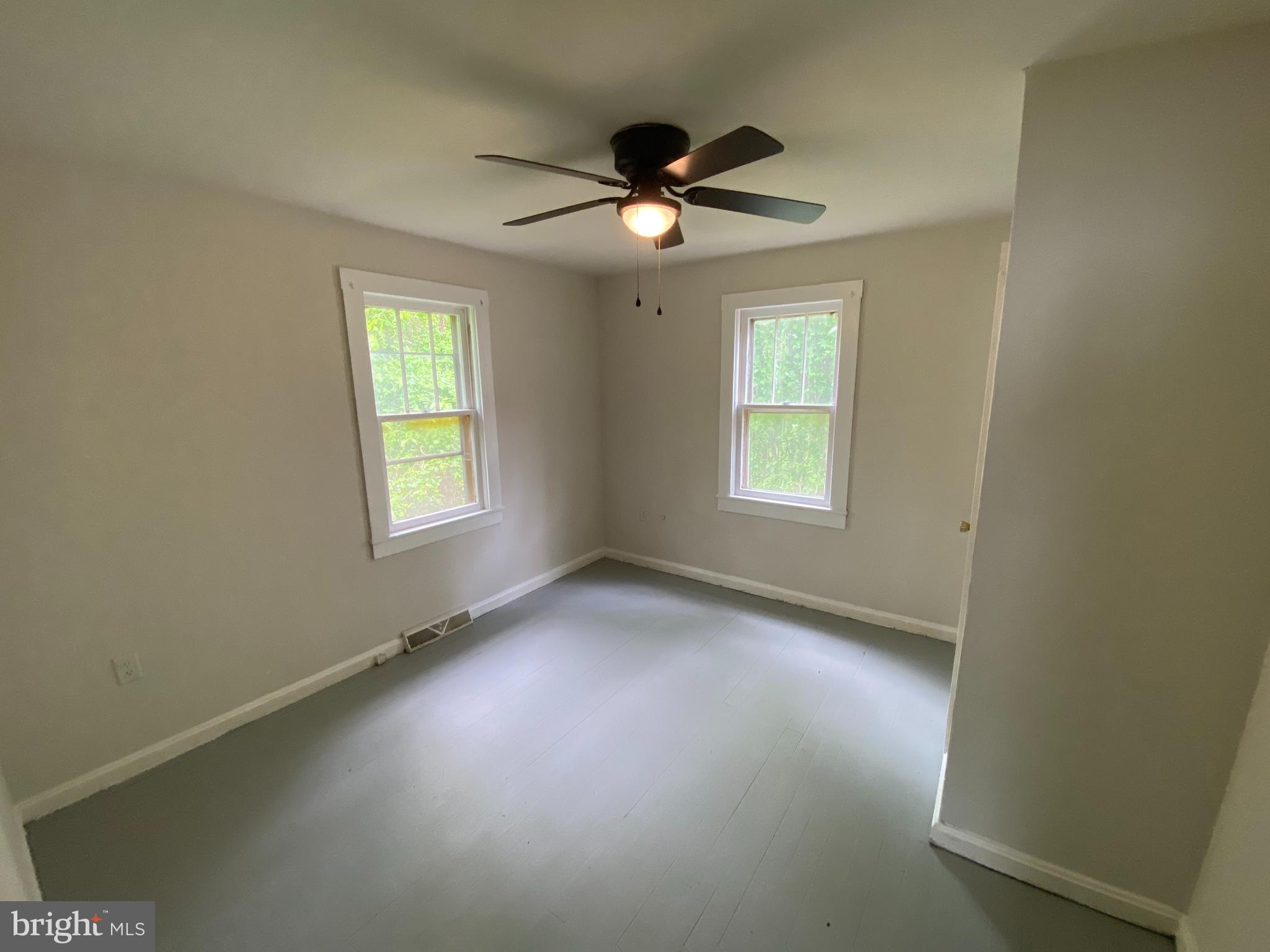 9067 St Anthonys Road King George, VA 22485 - Photo 14 of 24 a view of an empty room with a window