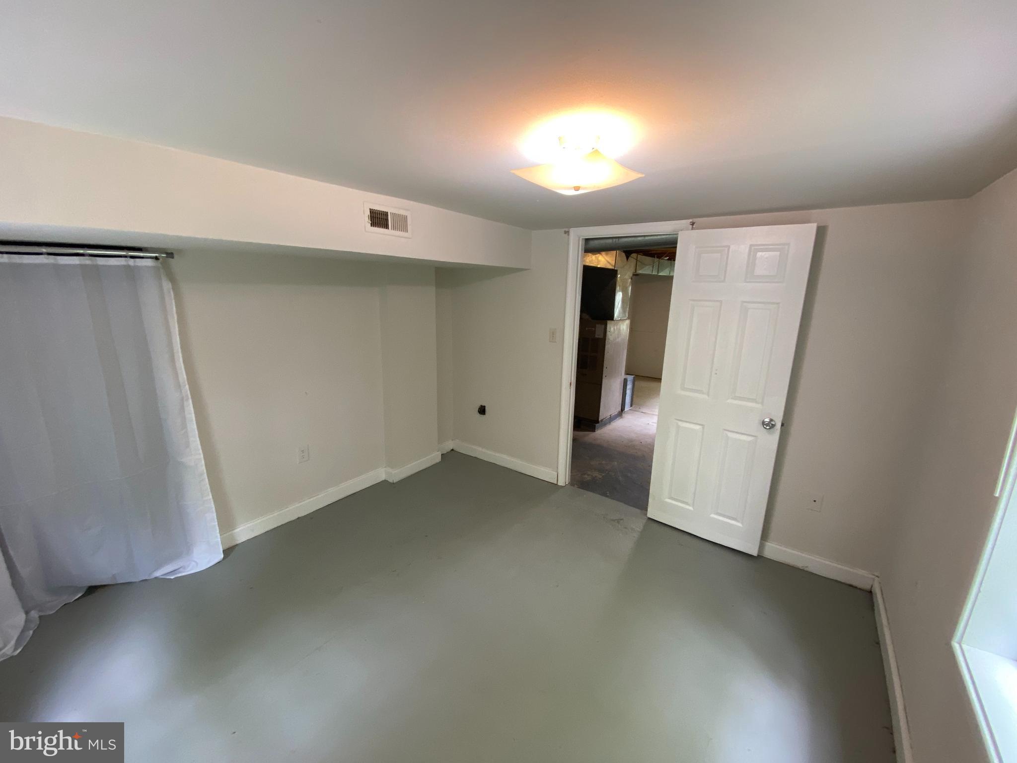 9067 St Anthonys Road King George, VA 22485 - Photo 24 of 24 an empty room with a window