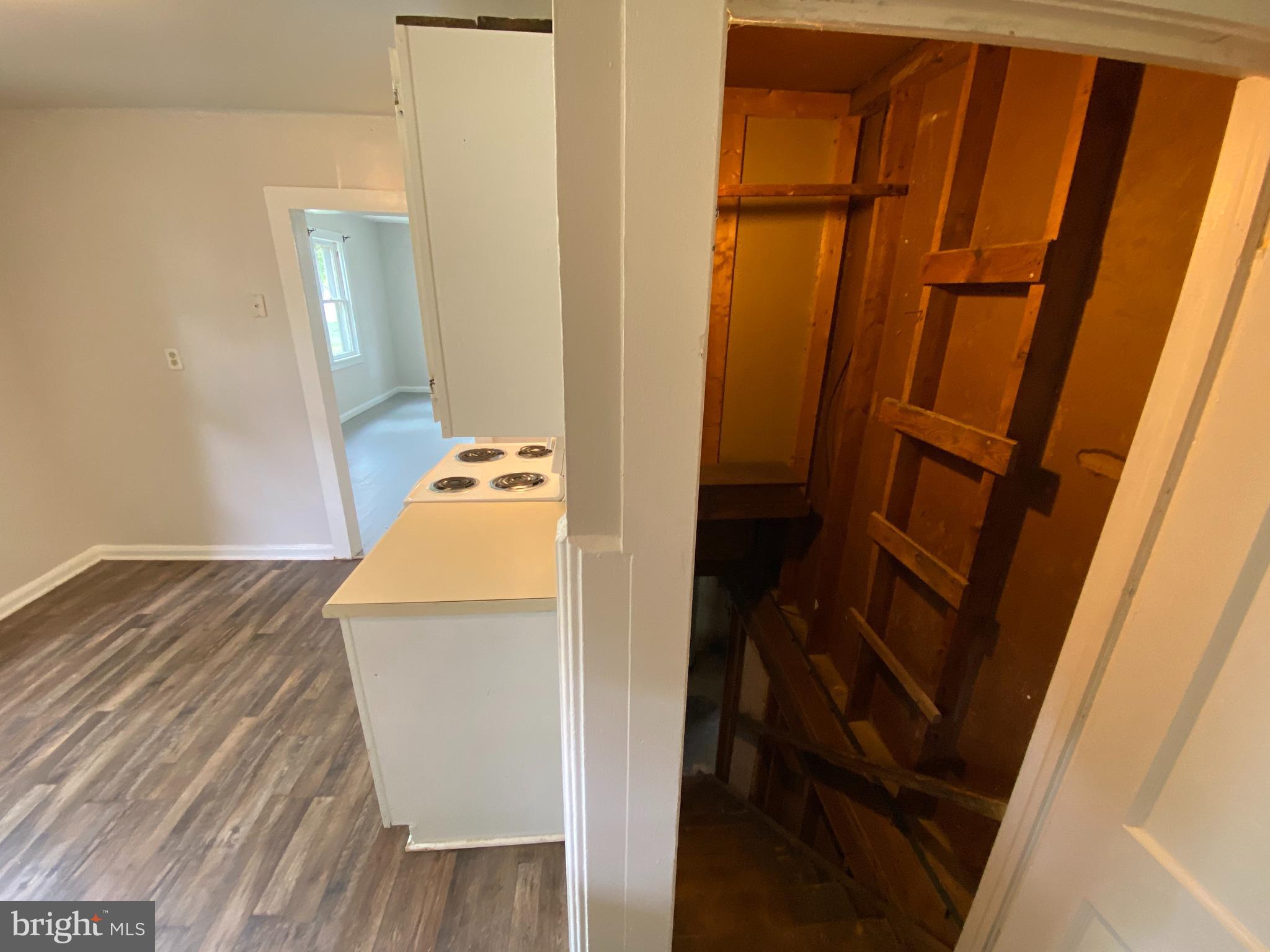 9067 St Anthonys Road King George, VA 22485 - Photo 8 of 24 a bedroom with a bed and wooden floor