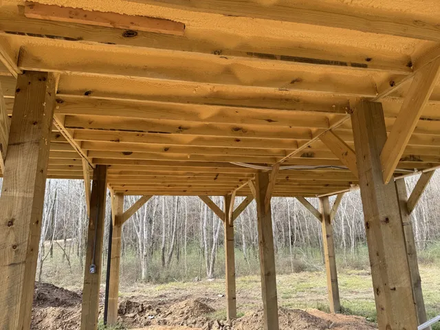 a backyard of a house with a lake view