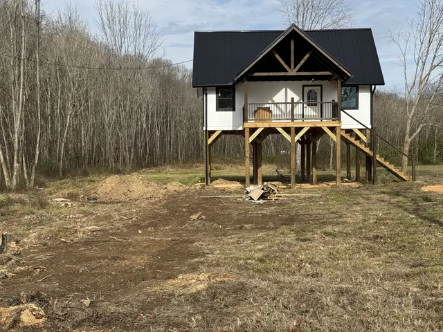 a sign broad on side of a road