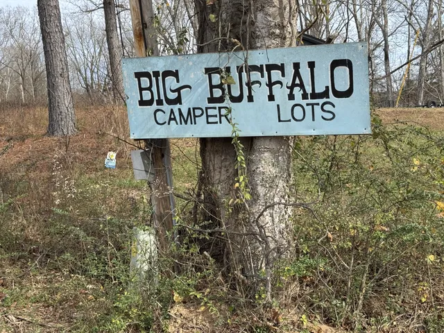 a view of entryway with hall way with wooden floor