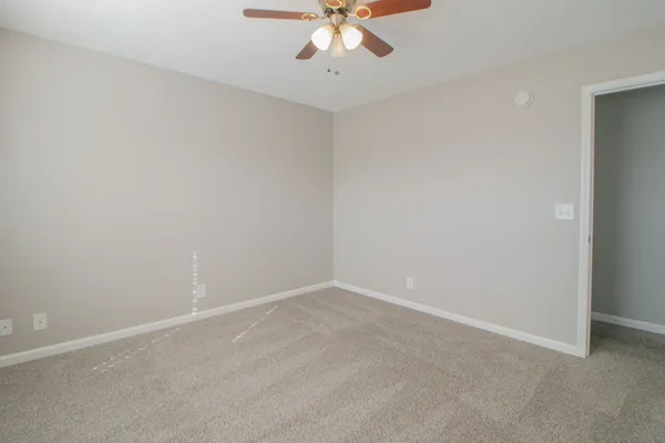a view of an empty walk in closet