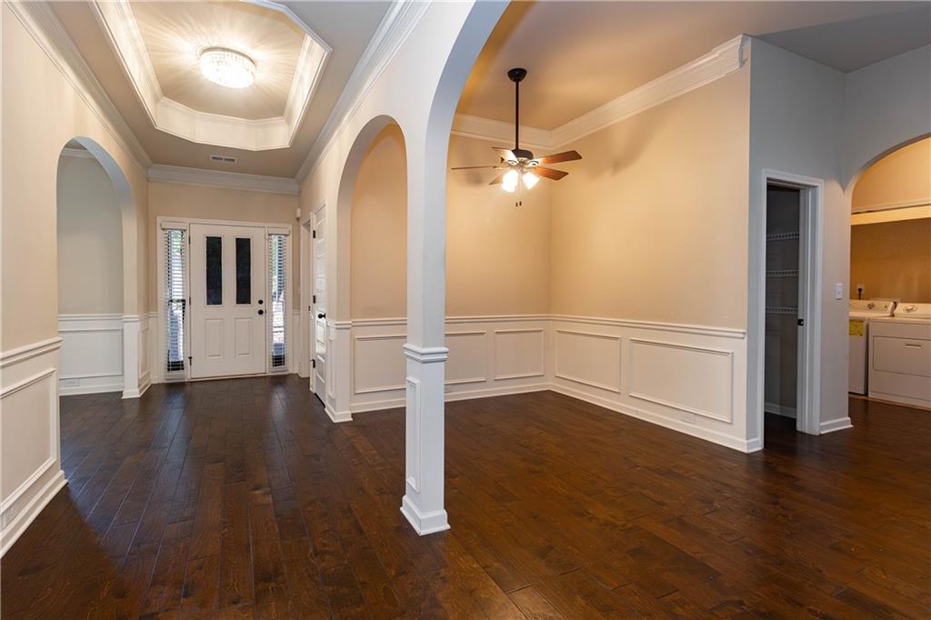 70 Sylvan Loop Fayetteville, GA 30214 - Photo 11 of 40 wooden floor in an empty room with a window