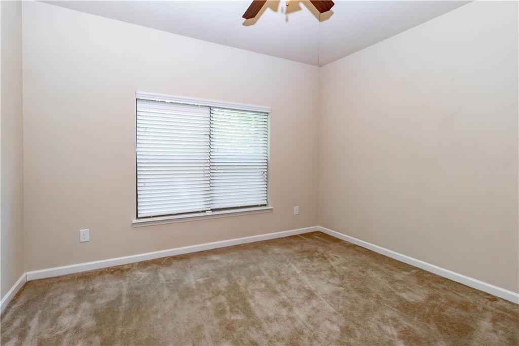 70 Sylvan Loop Fayetteville, GA 30214 - Photo 16 of 40 an empty room with a window