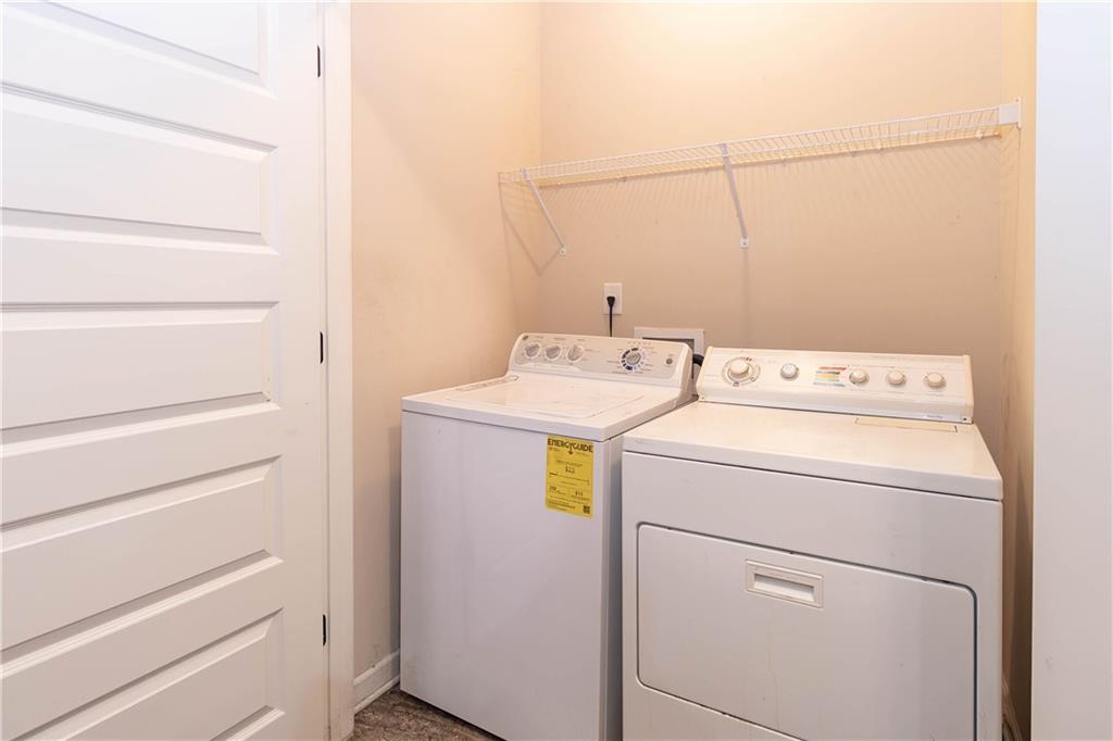 70 Sylvan Loop Fayetteville, GA 30214 - Photo 26 of 40 a utility room with dryer and washer