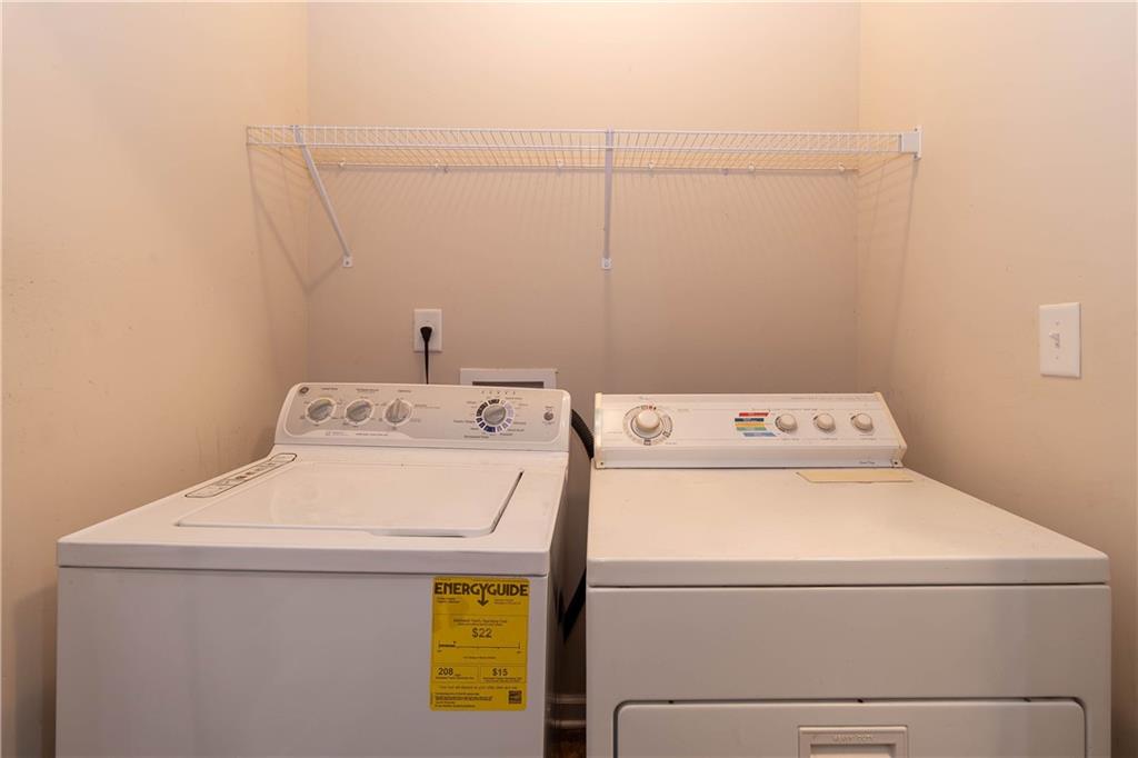70 Sylvan Loop Fayetteville, GA 30214 - Photo 27 of 40 a utility room with dryer and washer