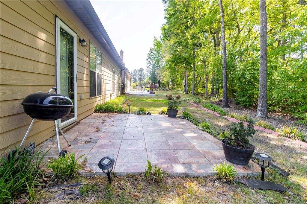 70 Sylvan Loop Fayetteville, GA 30214 - Photo 39 of 40 a front view of a house with garden