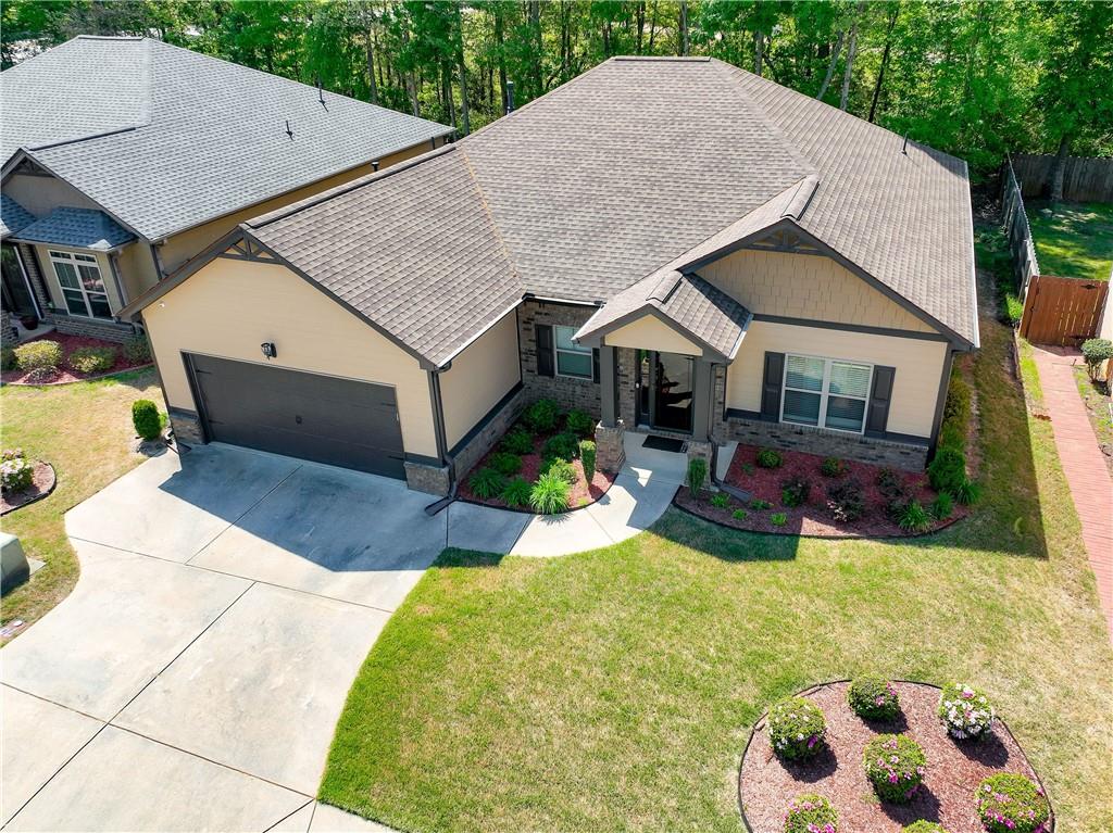 70 Sylvan Loop Fayetteville, GA 30214 - Photo 5 of 40 a view of a house with a yard and potted plants