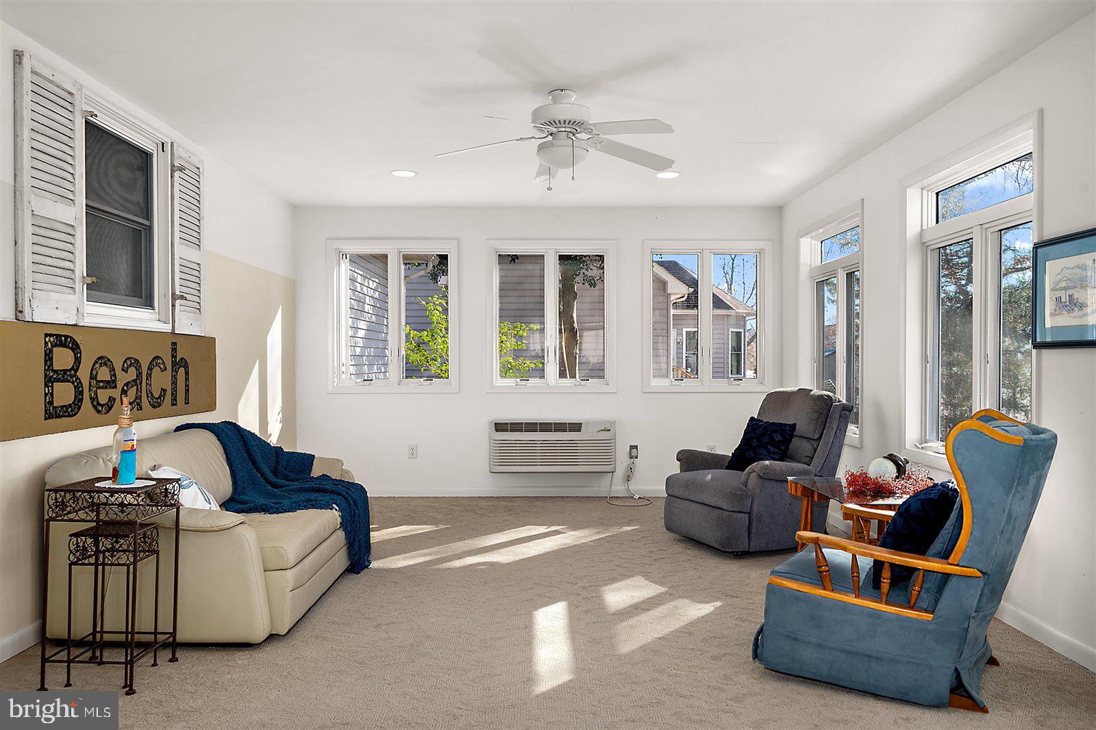12 Windmill Lane Ocean View, DE 19970 - Photo 35 of 54 a living room with furniture and a window