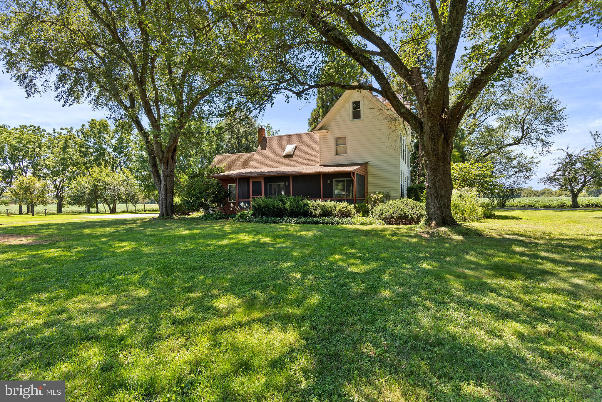 8293 Brices Mill Road Chestertown, MD 21620 - Photo 11 of 59 a front view of a house with garden
