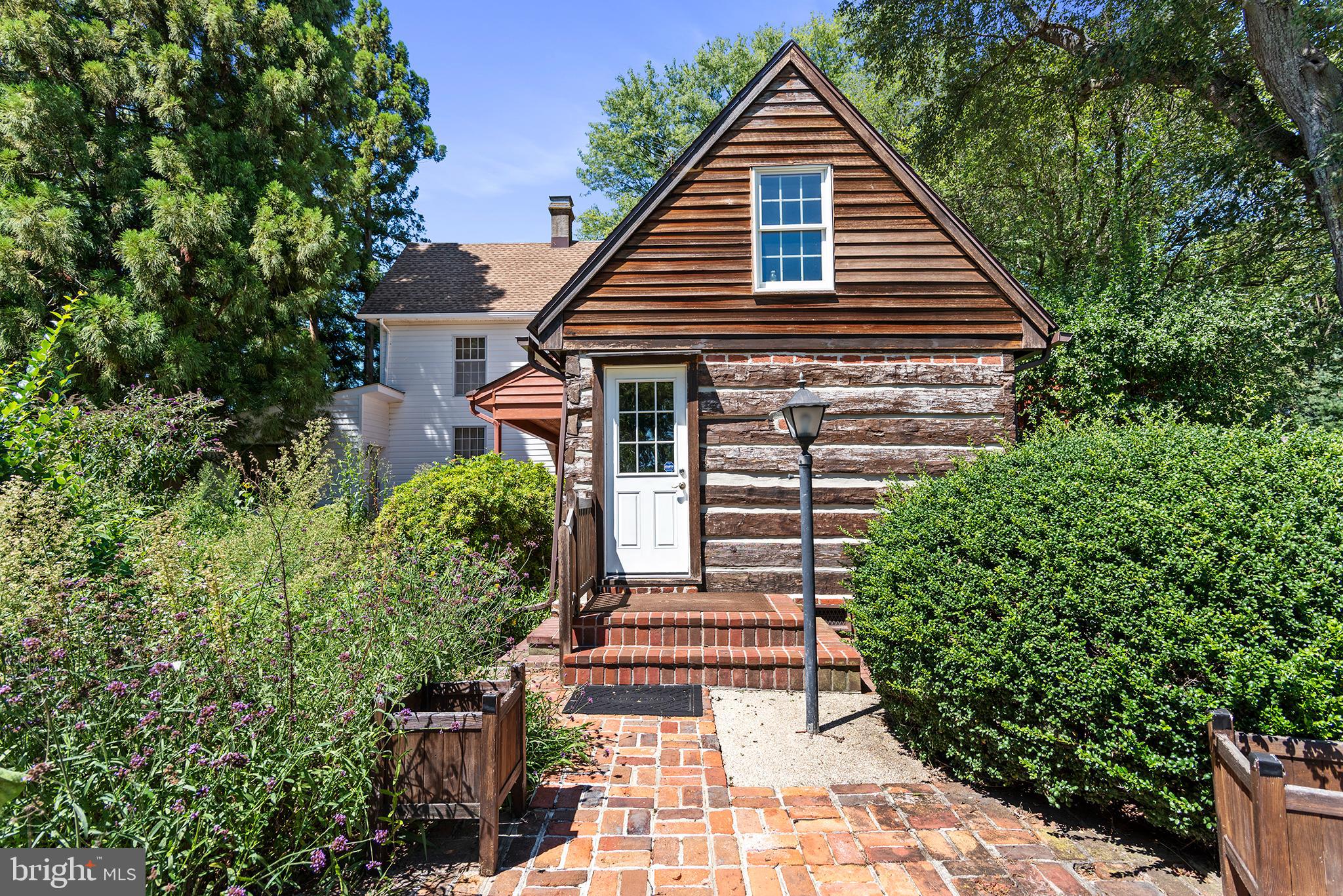 8293 Brices Mill Road Chestertown, MD 21620 - Photo 16 of 59 a view of a house with a yard