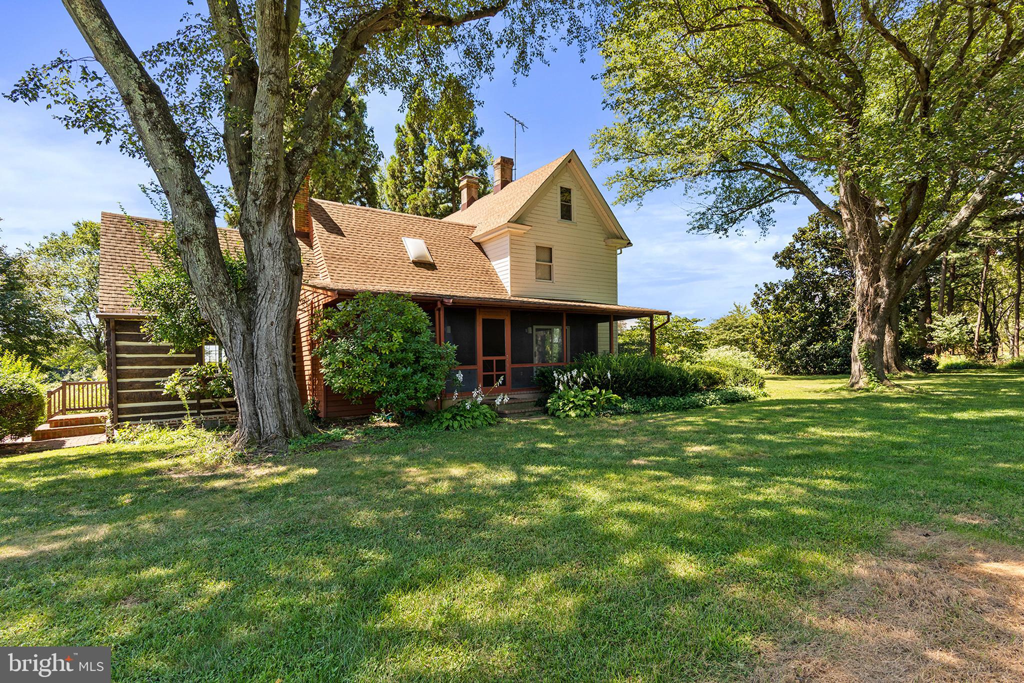 8293 Brices Mill Road Chestertown, MD 21620 - Photo 3 of 59 a front view of a house with garden