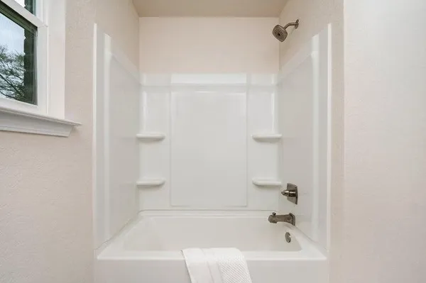 a bathroom with a bathtub