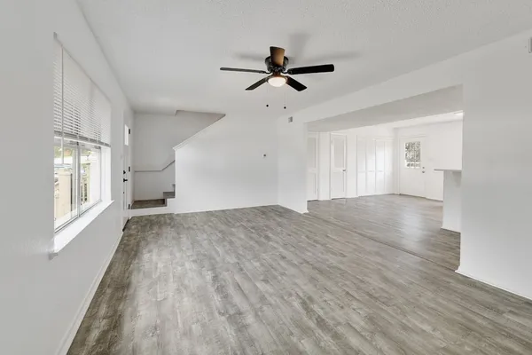 an empty room with windows