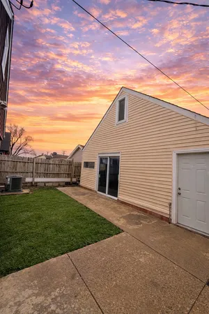 a backyard of a house with lots of green space